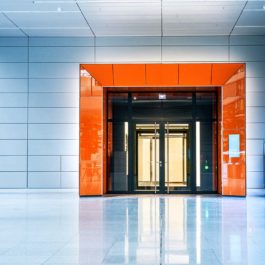 man walking through government building