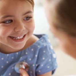 little girl and woman at doctor's office