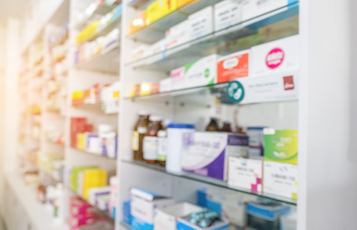 blurry closeup of pharmacy shelf