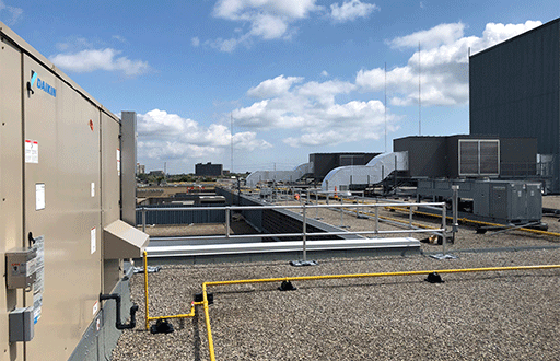 Image of a Daikin Unit on the rooftop of a building.