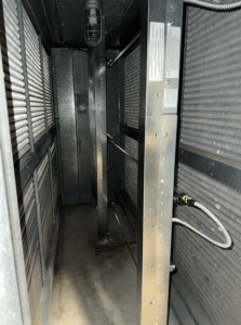 HTS Project CarletonUniversity Main 4 2025 1 HTS | Commercial & Industrial HVAC Systems, Parts, & Services Company HVAC unit interior showing misting nozzles and heat exchange coils.